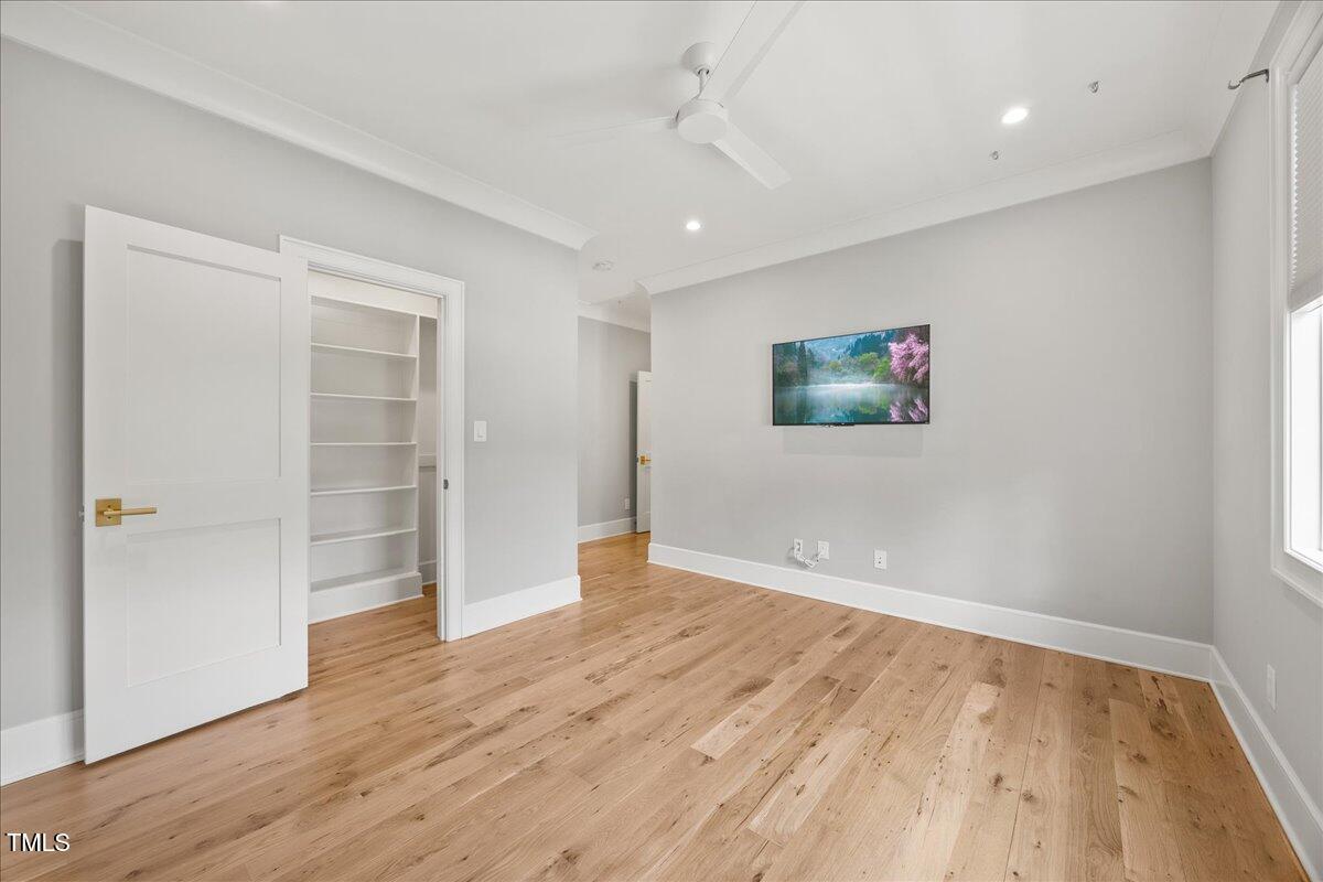 2120 Kipawa Street Raleigh, NC 27607 - Photo 54 of 77 a view of empty room with wooden floor