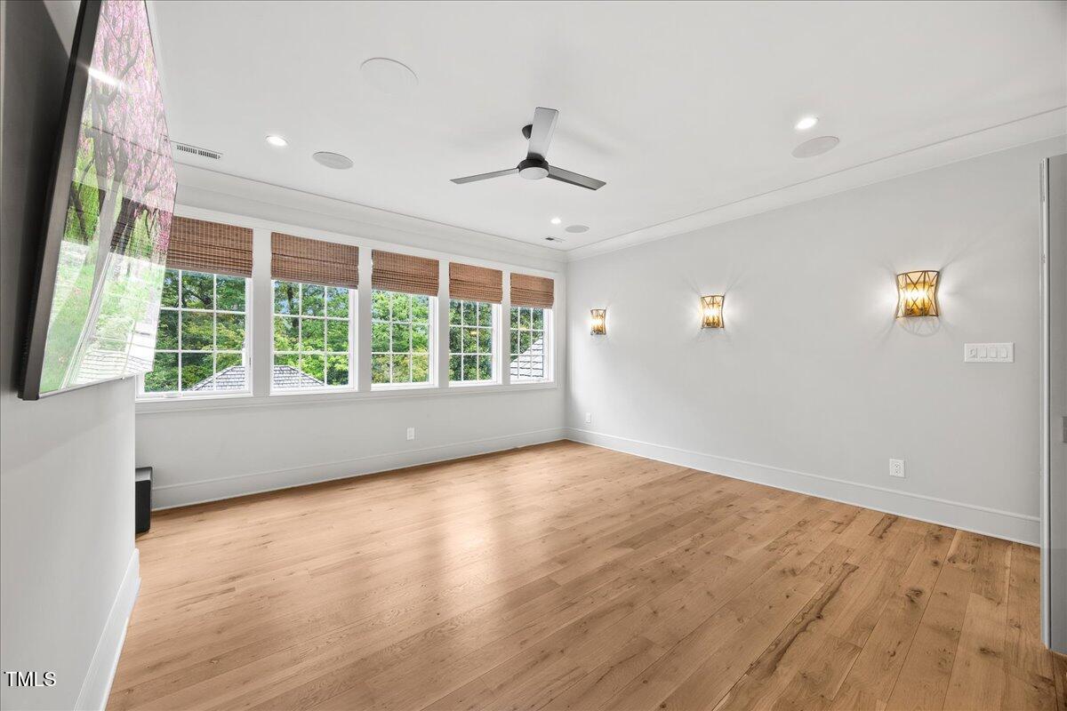 2120 Kipawa Street Raleigh, NC 27607 - Photo 58 of 77 an empty room with wooden floor and windows