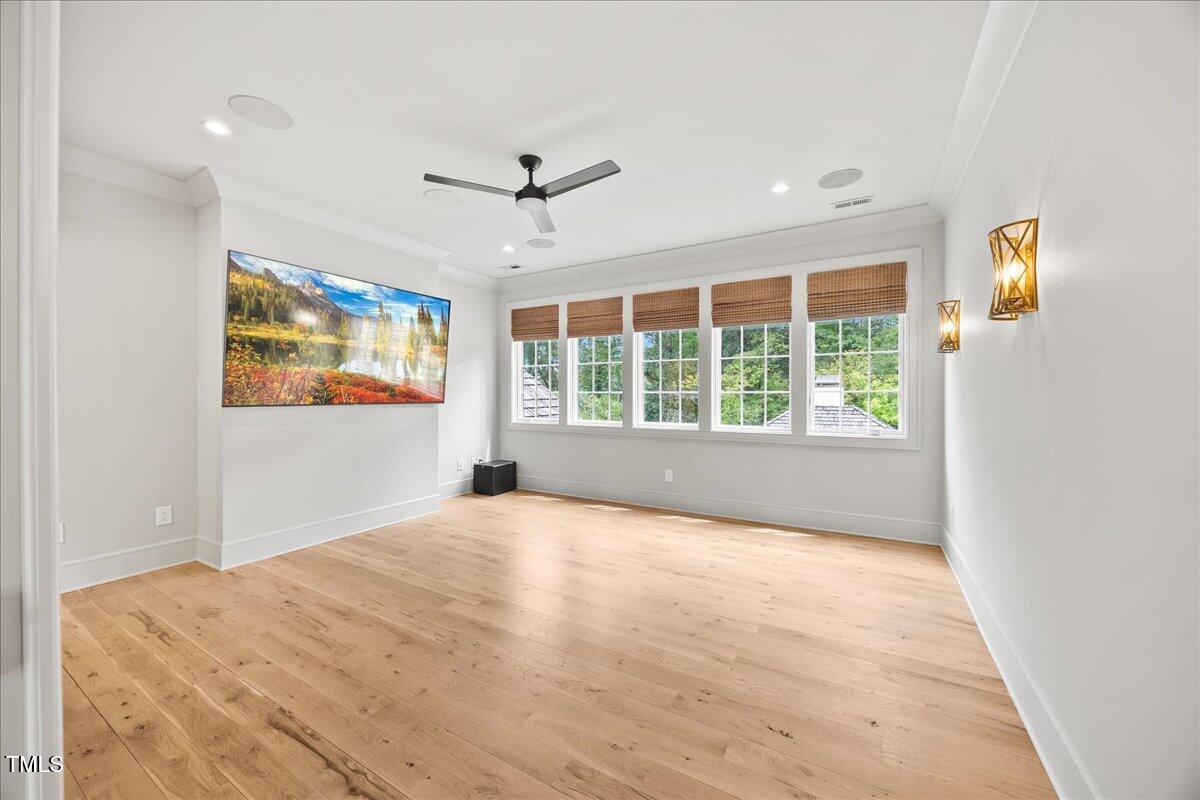 2120 Kipawa Street Raleigh, NC 27607 - Photo 59 of 77 a view of an empty room with a window and a kitchen area