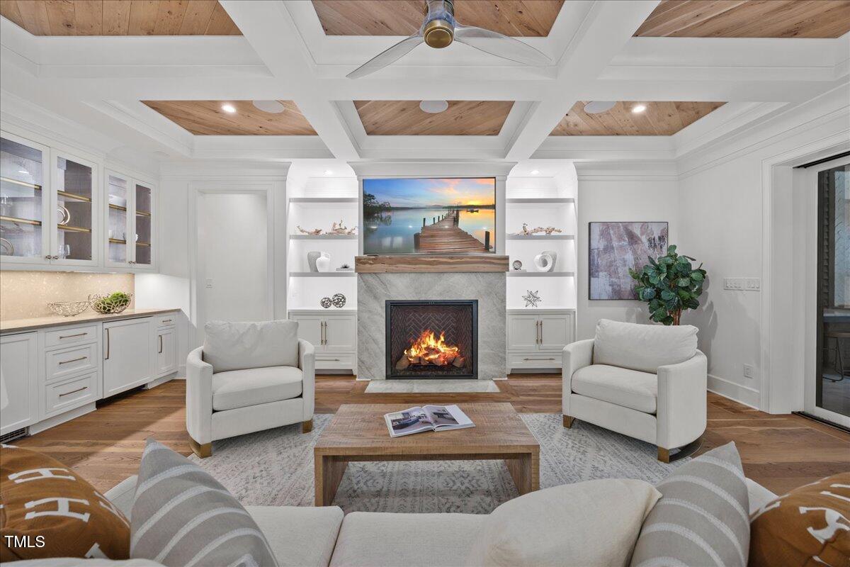 2120 Kipawa Street Raleigh, NC 27607 - Photo 10 of 77 a living room with furniture and a fireplace