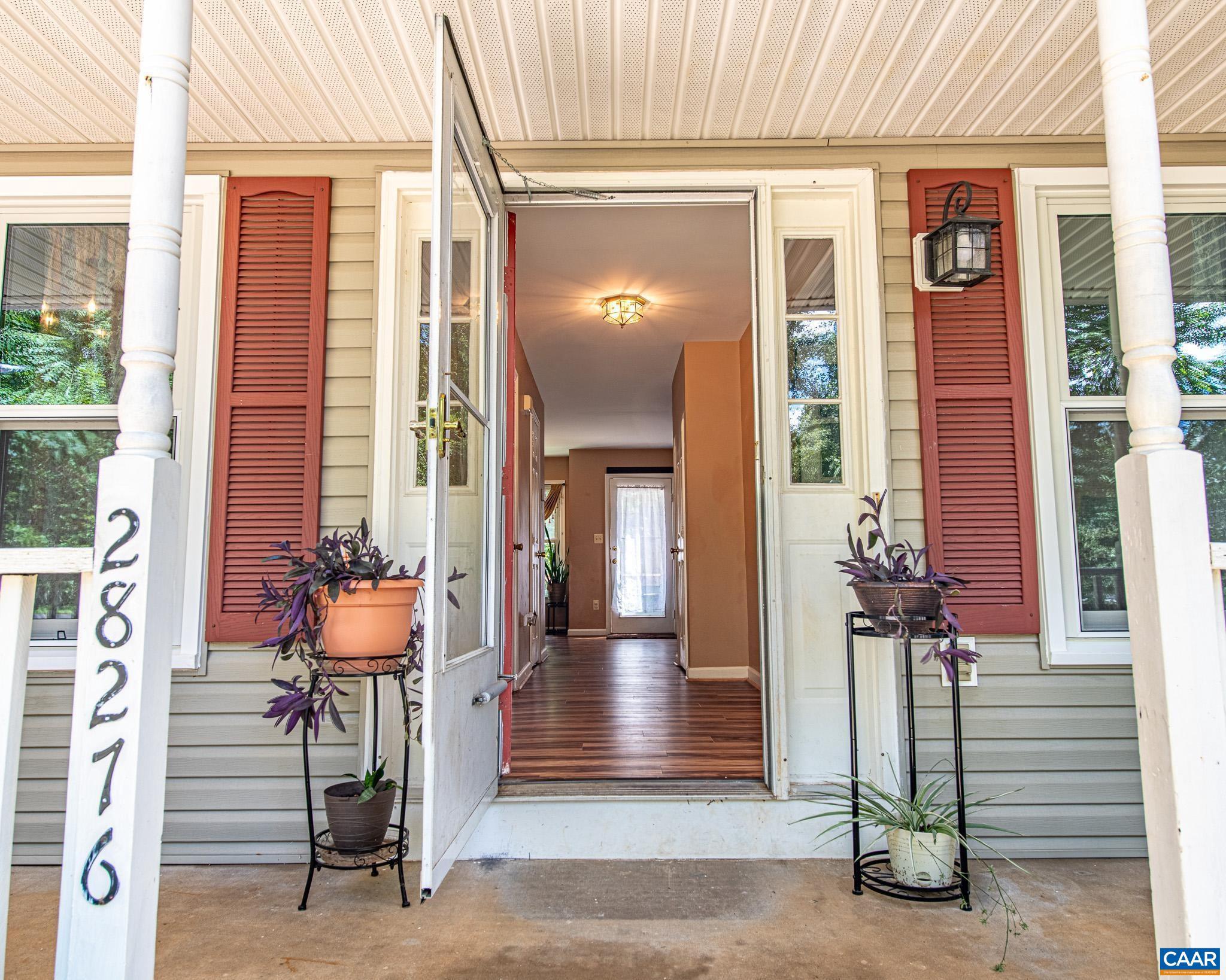 28276 Walnut Ridge Way Rhoadesville, VA 22542 - Photo 3 of 37 a view of an entryway of house with wooden floor
