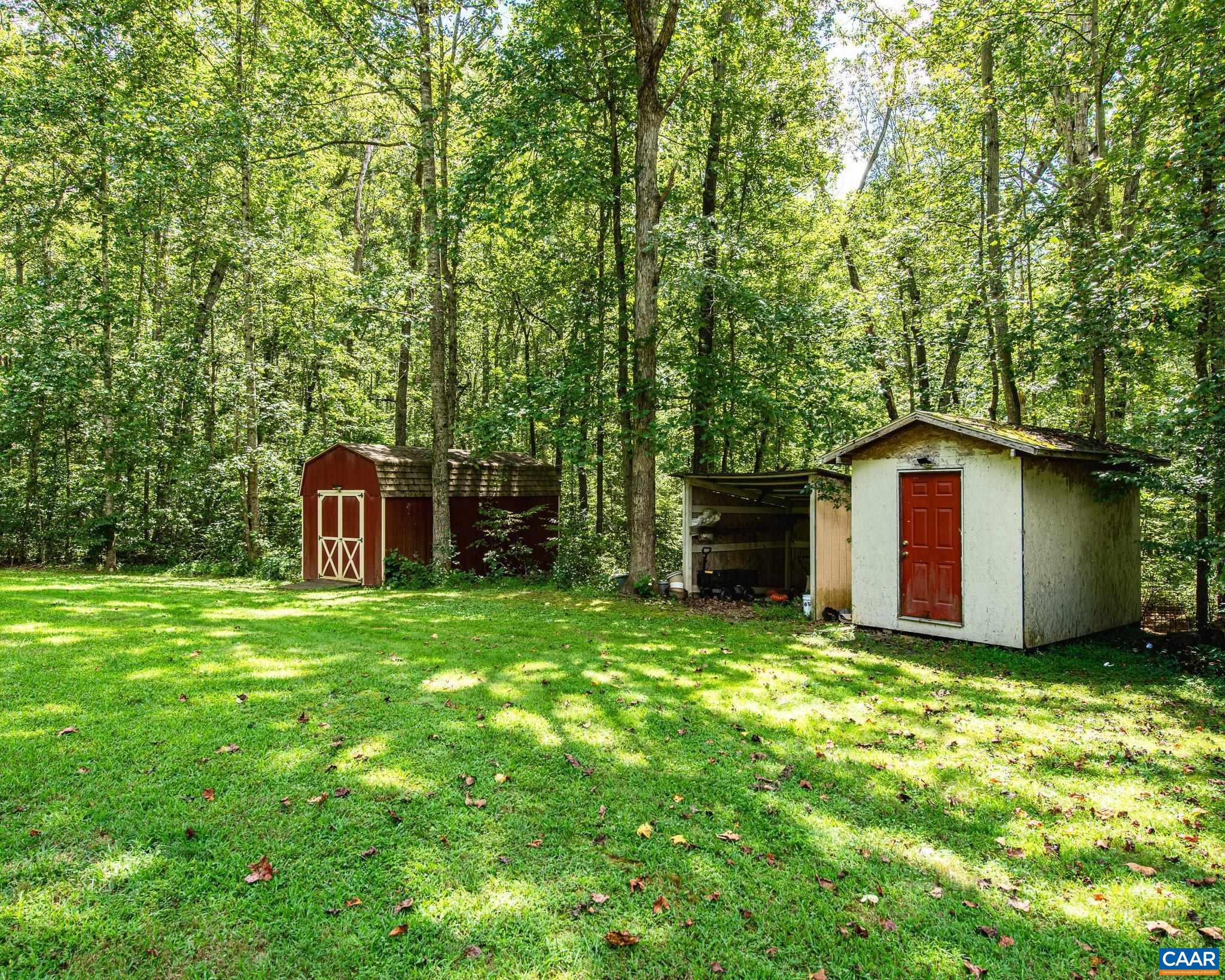 28276 Walnut Ridge Way Rhoadesville, VA 22542 - Photo 31 of 37 a view of a back yard of the house