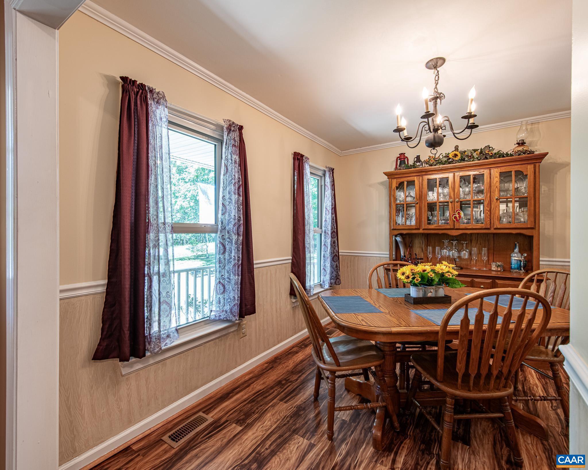 28276 Walnut Ridge Way Rhoadesville, VA 22542 - Photo 6 of 37 a view of a dining room with furniture window and outside view