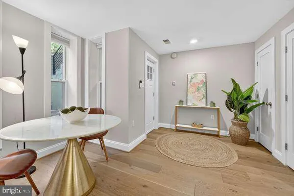 a workspace with furniture and window