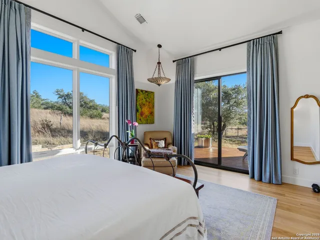 a view of a hallway with washer and dryer