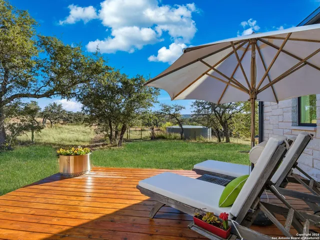 a bedroom with furniture and windows