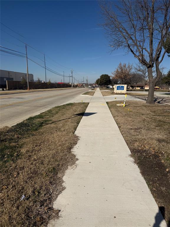 280 North Mitchell Road Mansfield, TX 76063 - Photo 5 of 9 a view of a yard with wooden fence