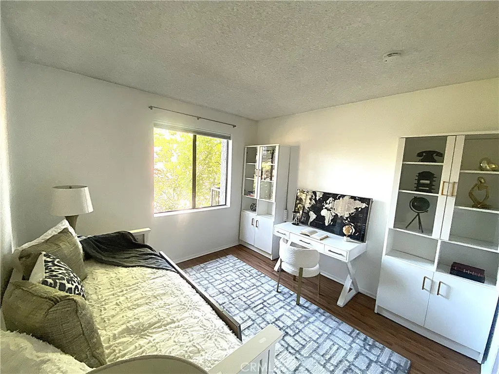 330 Cordova Street, Unit 261 Pasadena, CA 91101 - Photo 23 of 42 a bedroom with a bed and a window