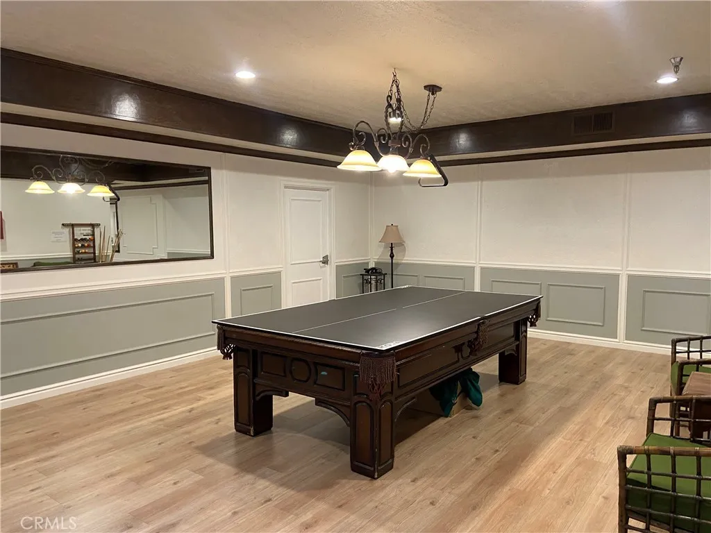 330 Cordova Street, Unit 261 Pasadena, CA 91101 - Photo 34 of 42 a room with pool table and wooden floor