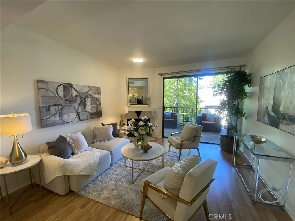 330 Cordova Street, Unit 261 Pasadena, CA 91101 - Photo 4 of 42 a living room with furniture and a flat screen tv
