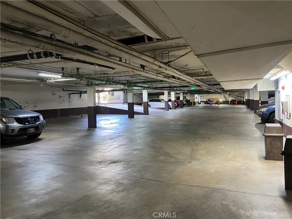 330 Cordova Street, Unit 261 Pasadena, CA 91101 - Photo 42 of 42 a view of parking garage with lots of cars