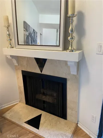 a stove top oven sitting inside of a kitchen