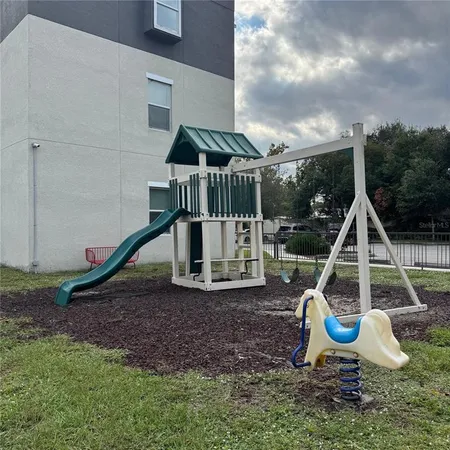 a view of outdoor space with trampoline