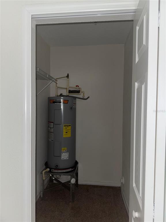 2121 McCoy Road, Unit 302 Orlando, FL 32809 - Photo 15 of 26 a room with storage and utility