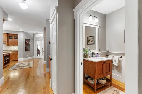 a en suite bathroom with a sink and a mirror