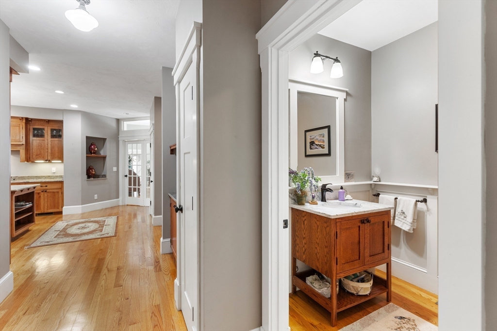 144 Brook Street Hudson, MA 01749 - Photo 17 of 44 a en suite bathroom with a sink and a mirror