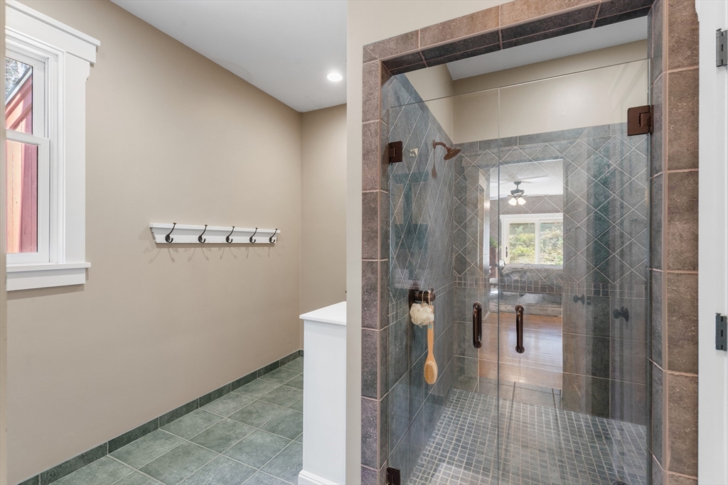144 Brook Street Hudson, MA 01749 - Photo 23 of 44 a bathroom with a shower and a sink