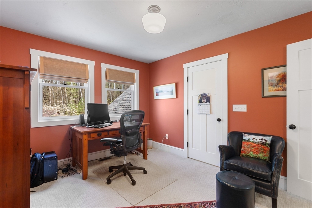 144 Brook Street Hudson, MA 01749 - Photo 24 of 44 a view of a livingroom with workspace and a window