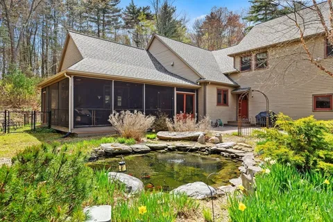 a front view of a house with swimming pool