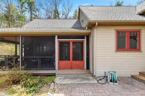 a view of house with outdoor space
