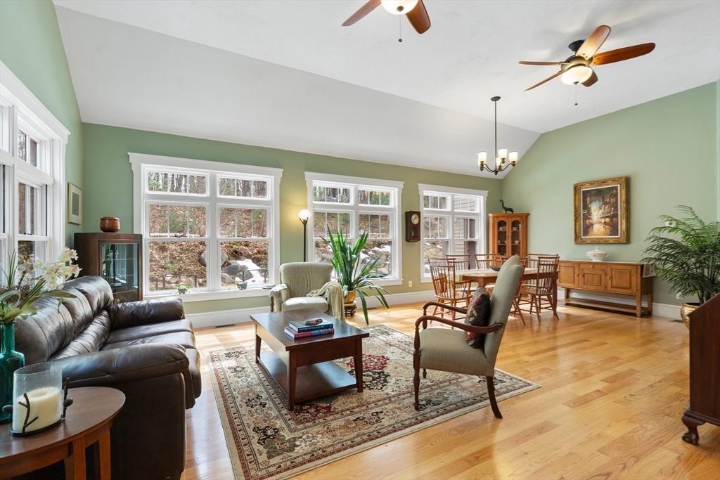 144 Brook Street Hudson, MA 01749 - Photo 6 of 44 a living room with furniture and a large window