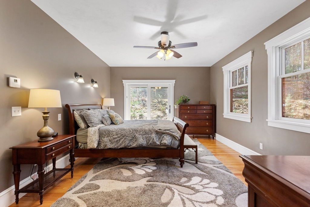 144 Brook Street Hudson, MA 01749 - Photo 7 of 44 a bed room with a bed and a window