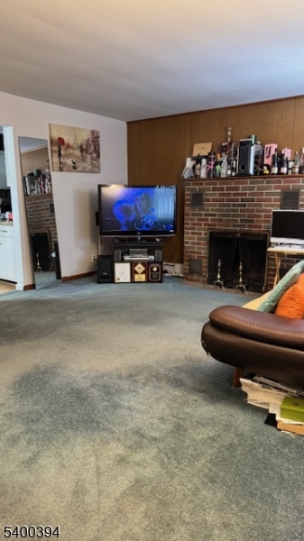 46 Guenther Place Passaic, NJ 07055 - Photo 5 of 10 a living room with furniture and a fireplace