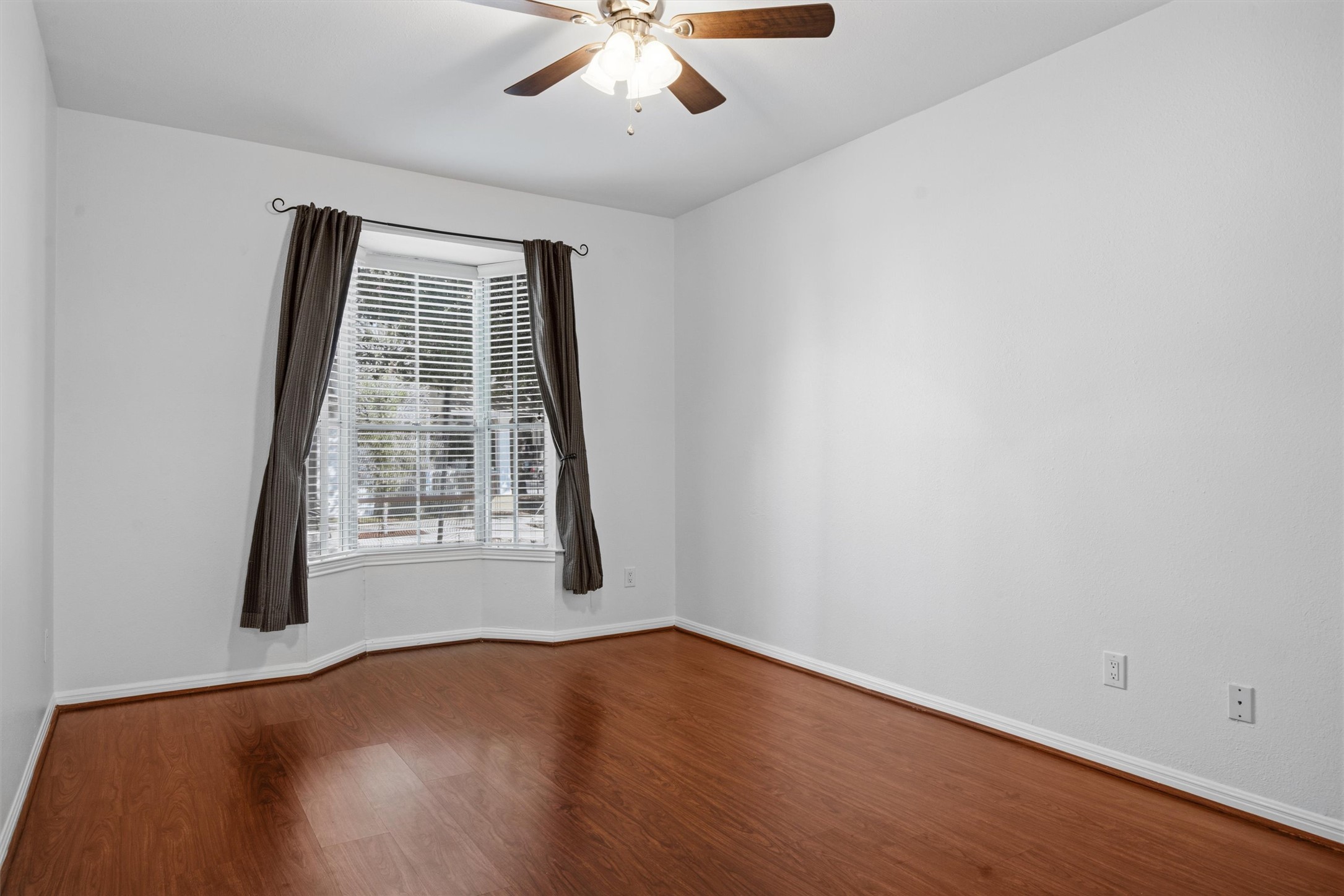 2529 Rio Grande Street, Unit 72 Austin, TX 78705 - Photo 18 of 24 a classic bay window elevates the second bedroom