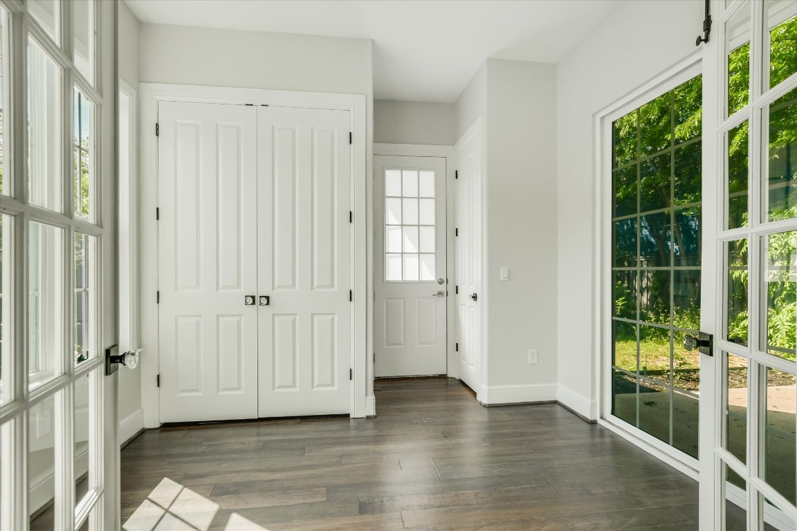 5200 Avenue H Austin, TX 78751 - Photo 17 of 20 an empty room with wooden floor and windows