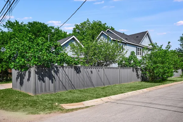 a house view with a backyard space