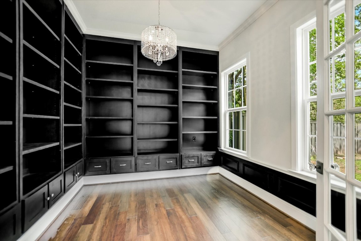5200 Avenue H Austin, TX 78751 - Photo 3 of 20 a view of a room with wooden floor and a window