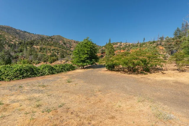 a view of a mountain view with mountains in the background