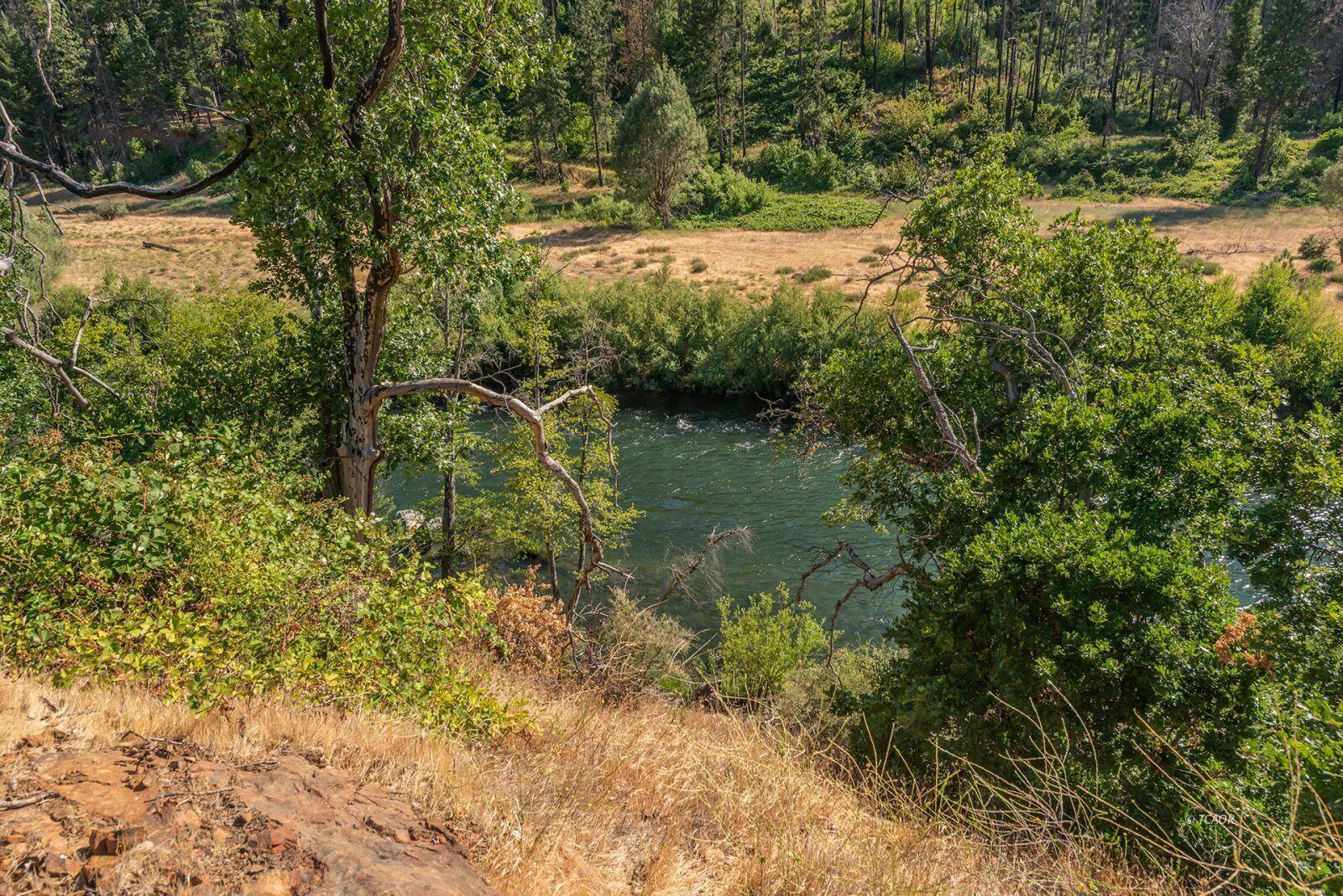 38550 Highway 299 Junction City, CA 96048 - Photo 5 of 12 a view of a lake with a yard