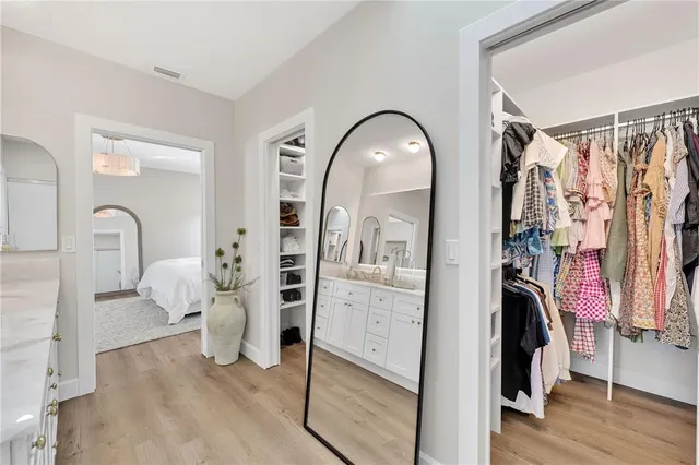 a bathroom with a shower and toilet