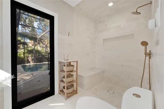 a view of a livingroom with furniture and window