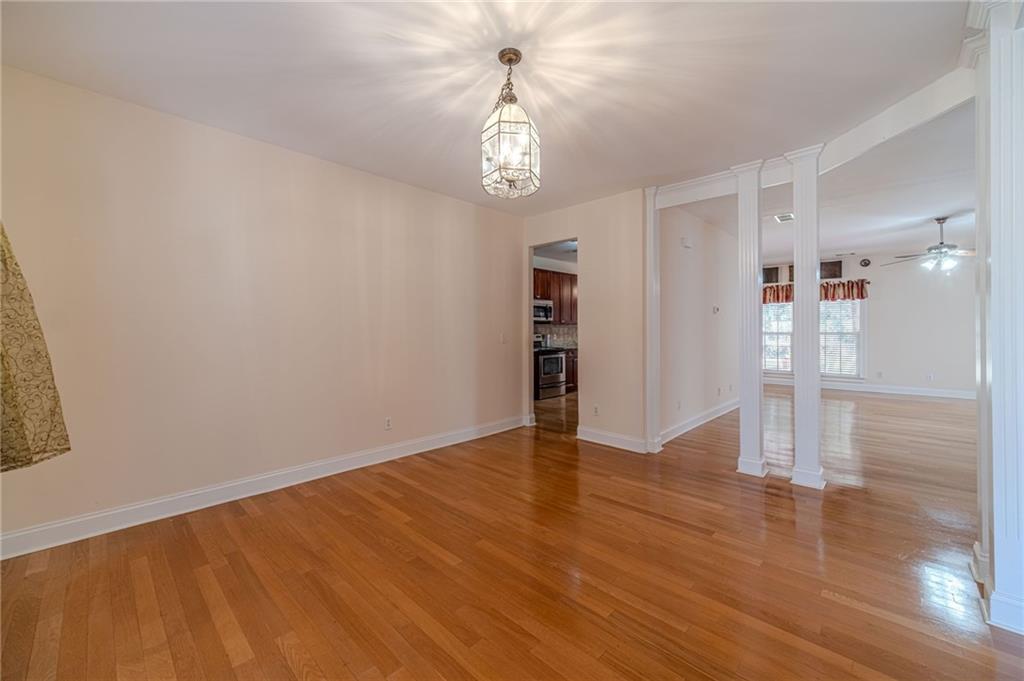 654 Huntington Trace Winder, GA 30680 - Photo 19 of 51 a view of an empty room with a window