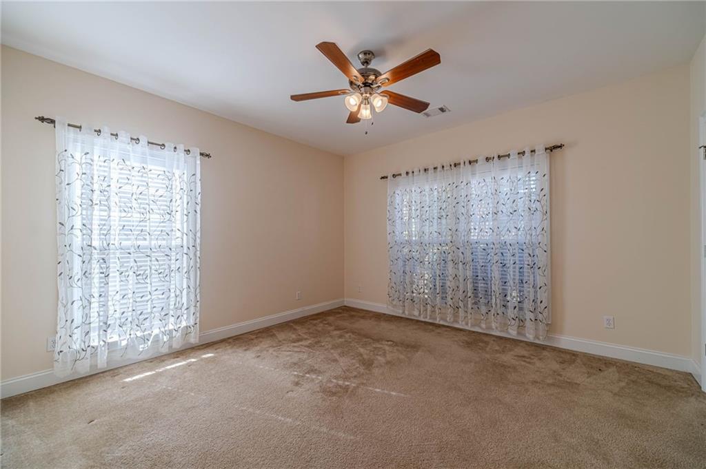 654 Huntington Trace Winder, GA 30680 - Photo 37 of 51 a view of an empty room with a window