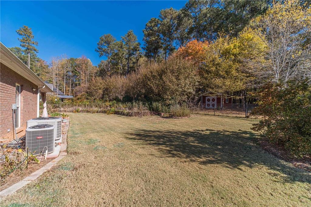 654 Huntington Trace Winder, GA 30680 - Photo 45 of 51 a view of a backyard of the house