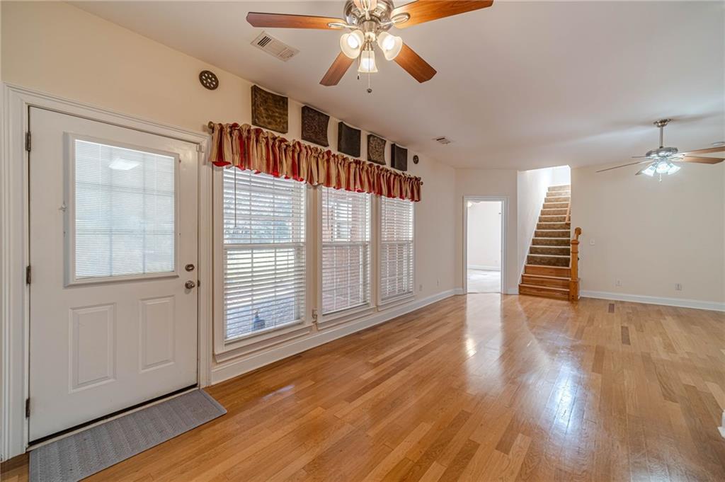 654 Huntington Trace Winder, GA 30680 - Photo 6 of 51 a view of an entryway with wooden floor