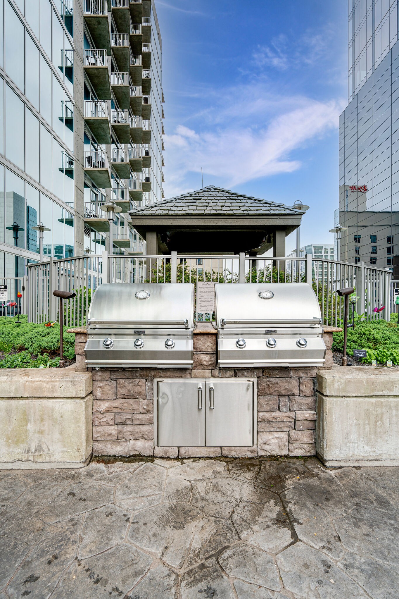 301 Demonbreun Street, Unit 1120 Nashville, TN 37201 - Photo 42 of 51 a view of a kitchen with a stove and cabinets