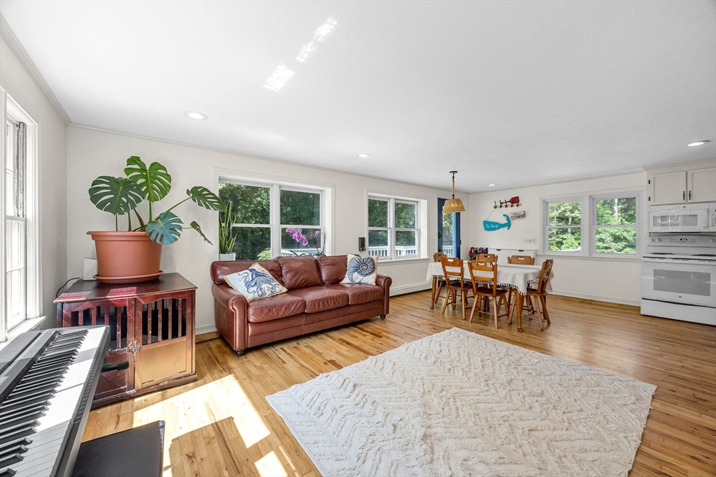 435 Old Mill Road Barnstable, MA 02655 - Photo 4 of 17 a living room with furniture and a large window