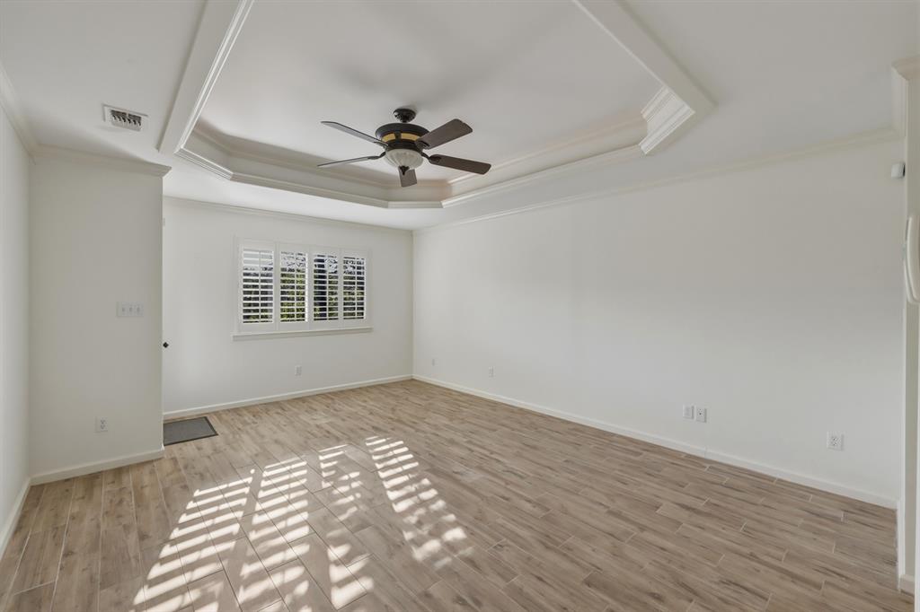 353 Deer Creek Road Big Sandy, TX 75755 - Photo 11 of 25 a view of empty room with wooden floor and fan