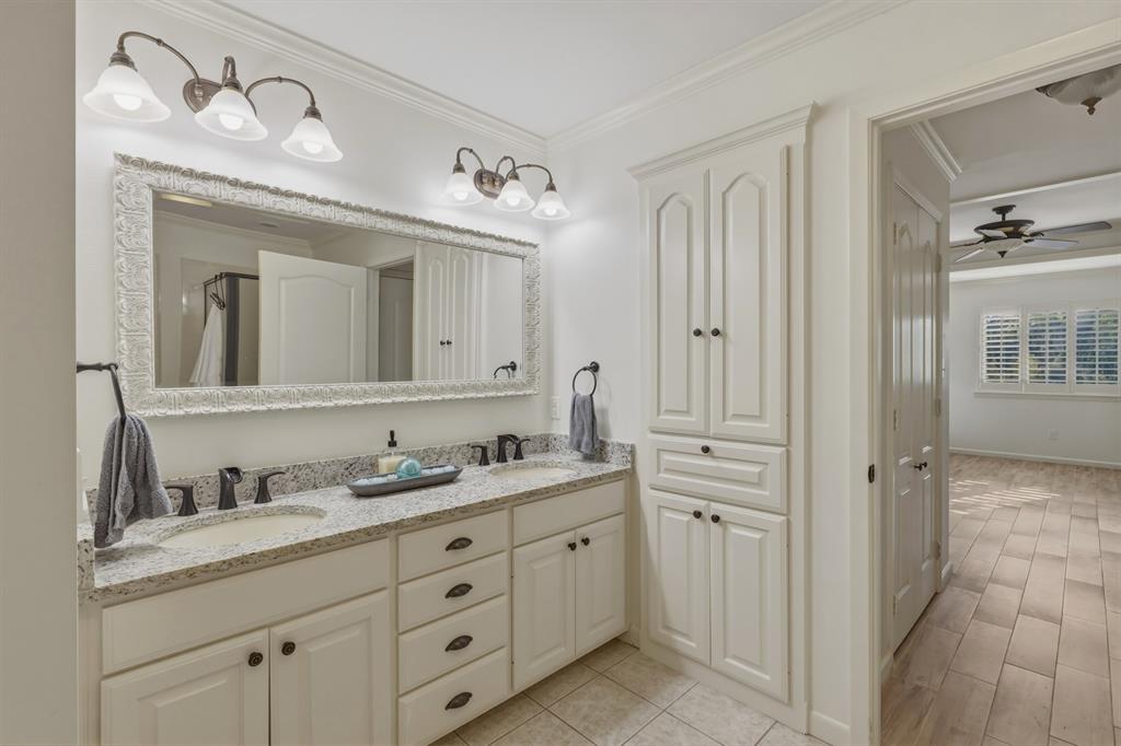 353 Deer Creek Road Big Sandy, TX 75755 - Photo 13 of 25 a spacious bathroom with a double vanity sink mirror and