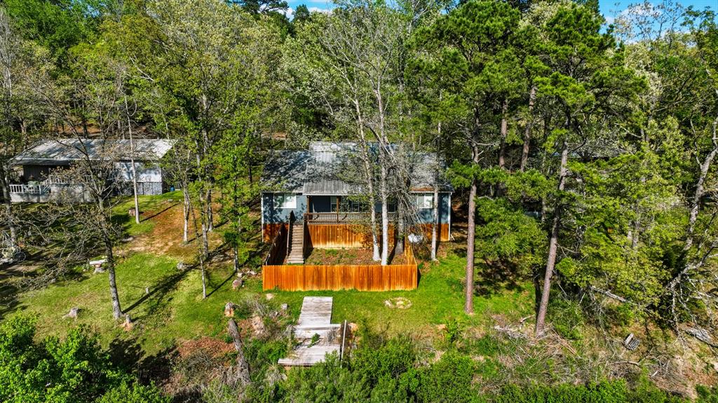 353 Deer Creek Road Big Sandy, TX 75755 - Photo 22 of 25 an aerial view of a house with swimming pool and garden view