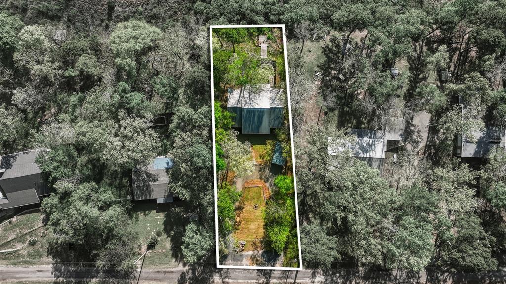 353 Deer Creek Road Big Sandy, TX 75755 - Photo 24 of 25 view of a garden