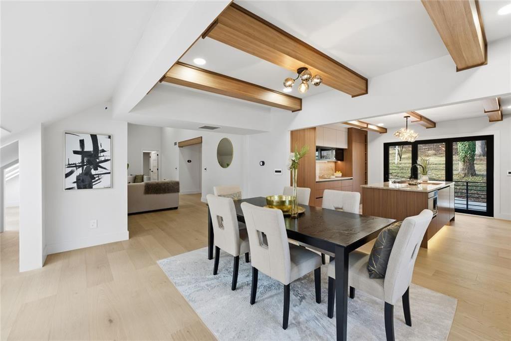 1253 Brooklawn Road Northeast Brookhaven, GA 30319 - Photo 13 of 55 a dining room with furniture and window