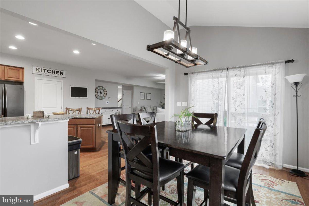 217 Morlyn Drive Stephenson, VA 22656 - Photo 12 of 35 a view of a dining room with furniture window and wooden floor