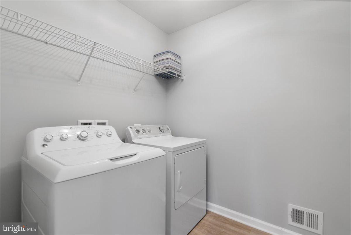 217 Morlyn Drive Stephenson, VA 22656 - Photo 23 of 35 a utility room with dryer and washer
