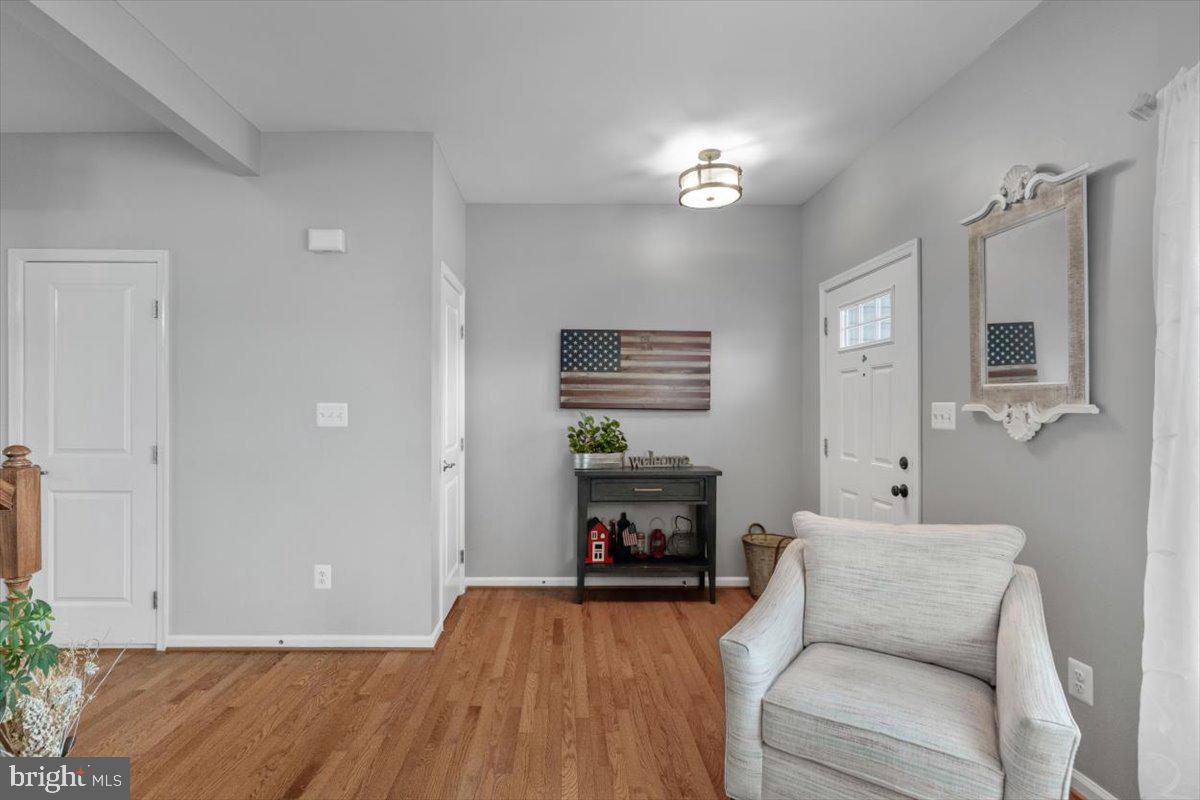 217 Morlyn Drive Stephenson, VA 22656 - Photo 4 of 35 a living room with furniture and a fireplace