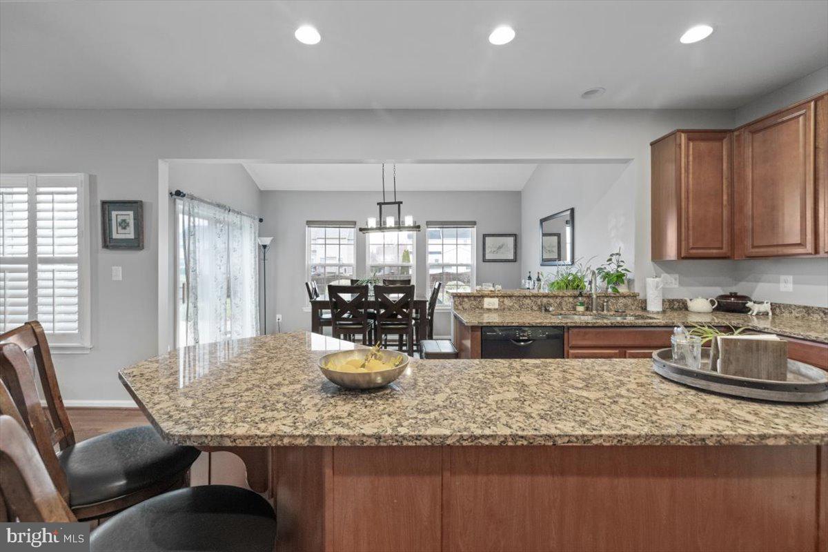 217 Morlyn Drive Stephenson, VA 22656 - Photo 9 of 35 a kitchen with a dining table chairs and kitchen view